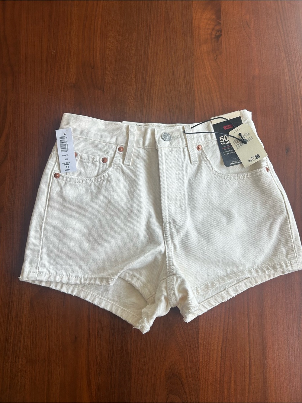 Levi’s High-Rise White Denim Shorts with Frayed Hem